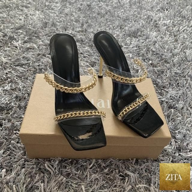 Clear transparent summer women sandals with square toes, high heels, open toes, slip-on style, fashionable chain detail by Stevvex.