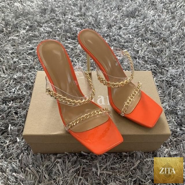 Clear transparent summer women sandals with square toes, high heels, open toes, slip-on design, stylish chain detail by Stevvex.
