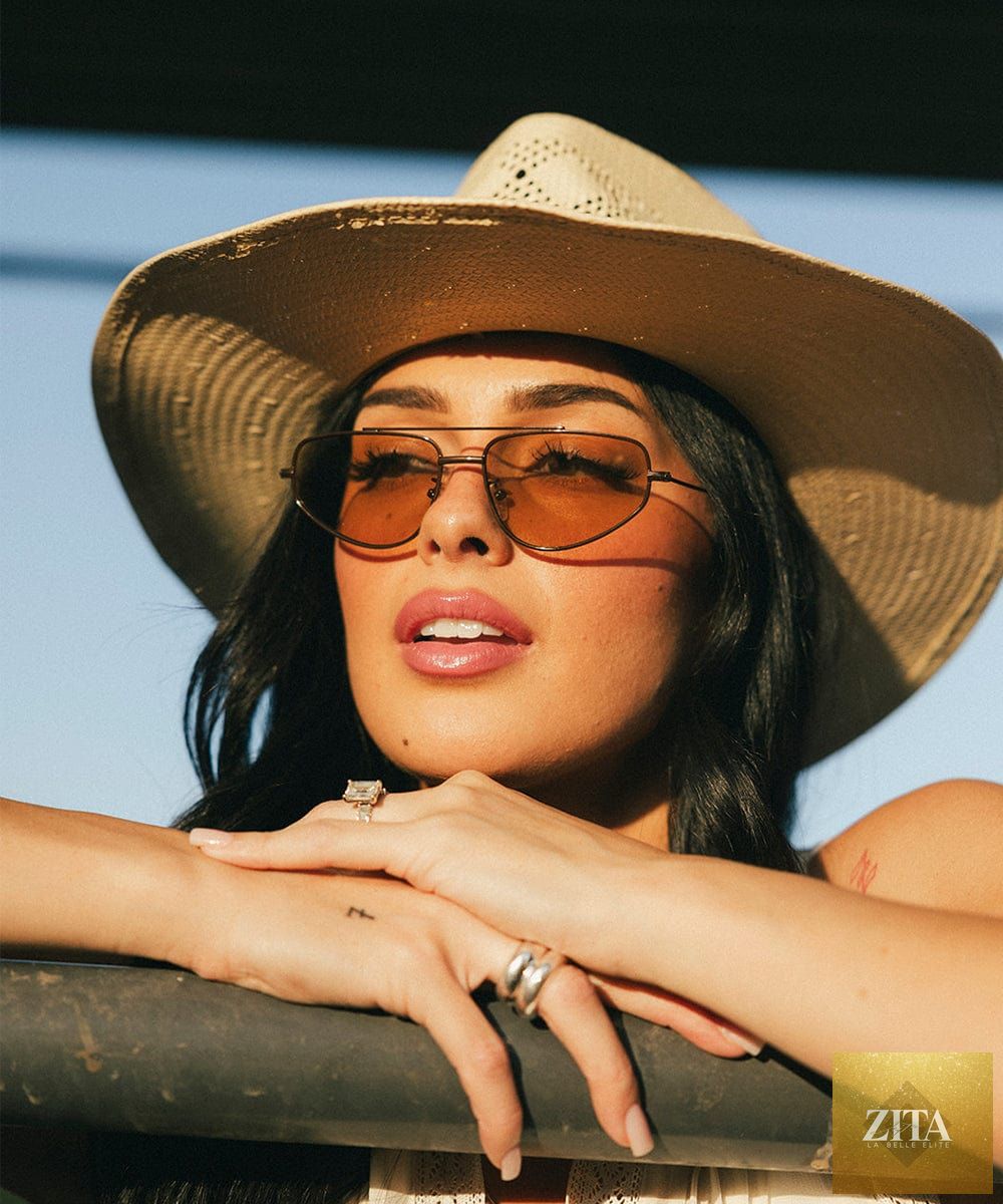 Brown Sienna aviator sunglasses by GIGI PIP with metal frames and dark lenses, stylish and classic eyewear accessory.