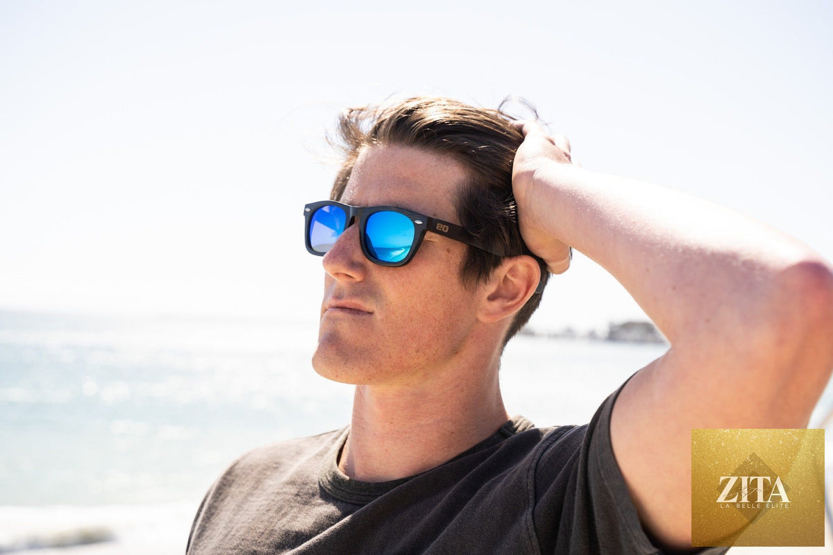 Bamboo floating sunglasses by Eastern Outer with round lenses and eco-friendly bamboo frames, perfect for water activities.