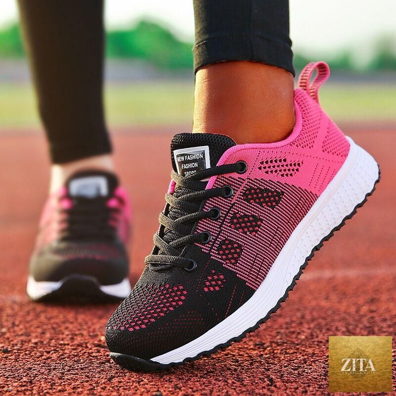 Stevvex women's white super-light sneakers with breathable mesh, casual flats, soft sole, and non-slip design for comfortable walking.