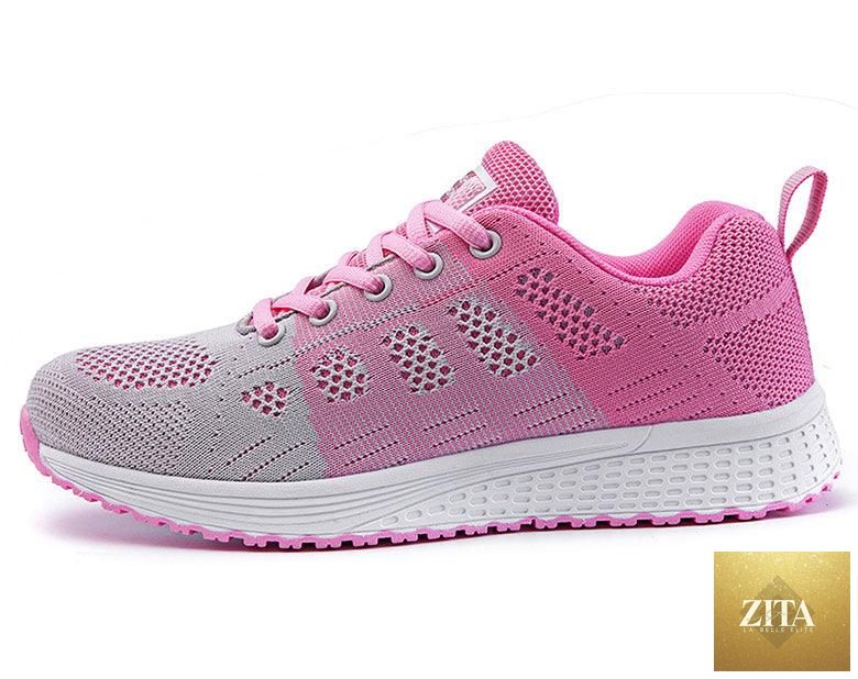 Stevvex women's white casual sneakers with breathable mesh, soft insoles, non-slip sole, ideal for walking and everyday wear.