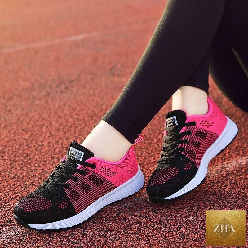 Stevvex women's white sneakers with breathable mesh, flat design, non-slip sole, lightweight, and casual comfort for walking.