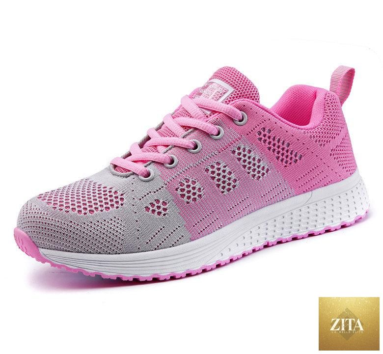 Stevvex women's white sneakers with breathable mesh, casual flats, soft soles, non-slip outsole, ideal for comfortable walking.