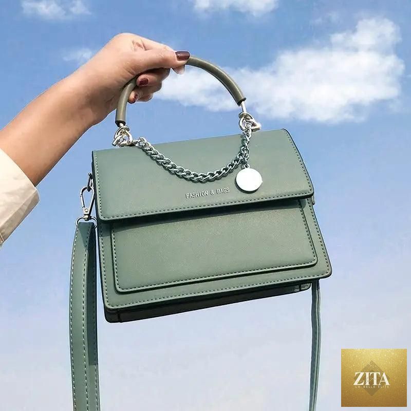 Elegant Stevvex square handbag for women, high-quality PU leather designer travel shoulder bag with a stylish, modern design.