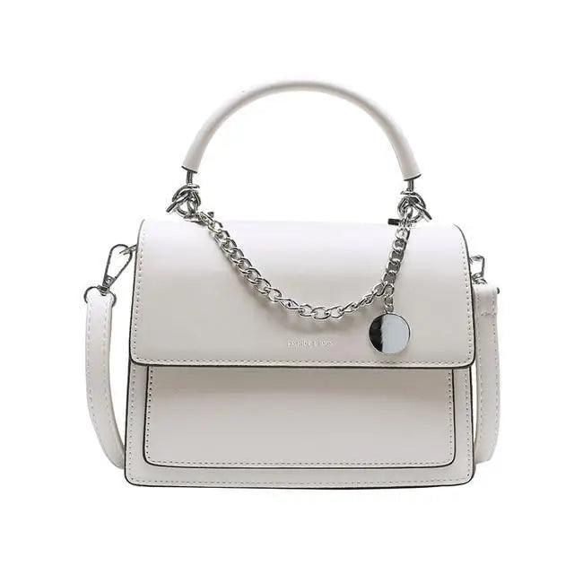 Elegant Stevvex genuine leather square handbag for women, high-quality PU leather shoulder bag for travel and daily use.