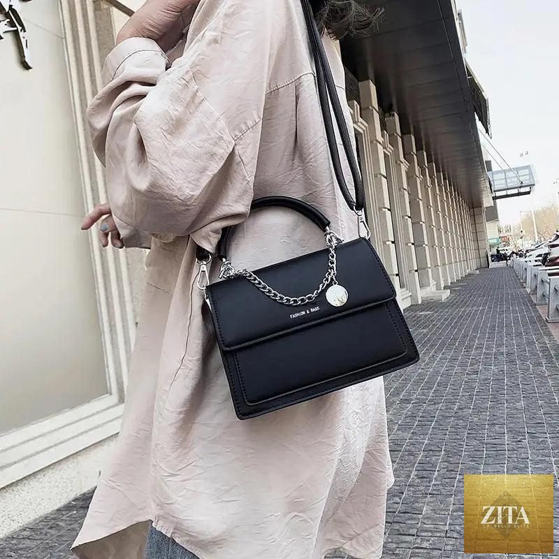 Elegant genuine leather square handbag for women by Stevvex, stylish PU leather shoulder bag for travel and everyday use.