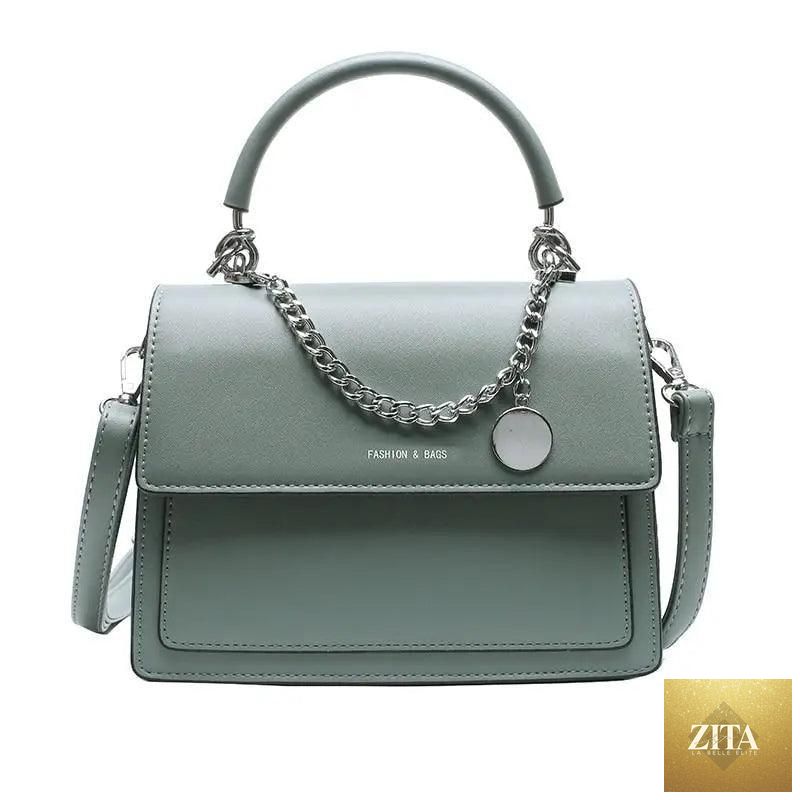 Elegant Stevvex genuine leather square handbag for women, high-quality PU leather shoulder bag for travel and stylish occasions.