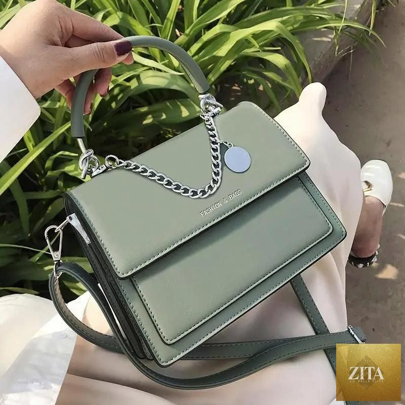 Elegant Stevvex genuine leather square handbag for women, stylish high-quality PU leather travel shoulder bag.