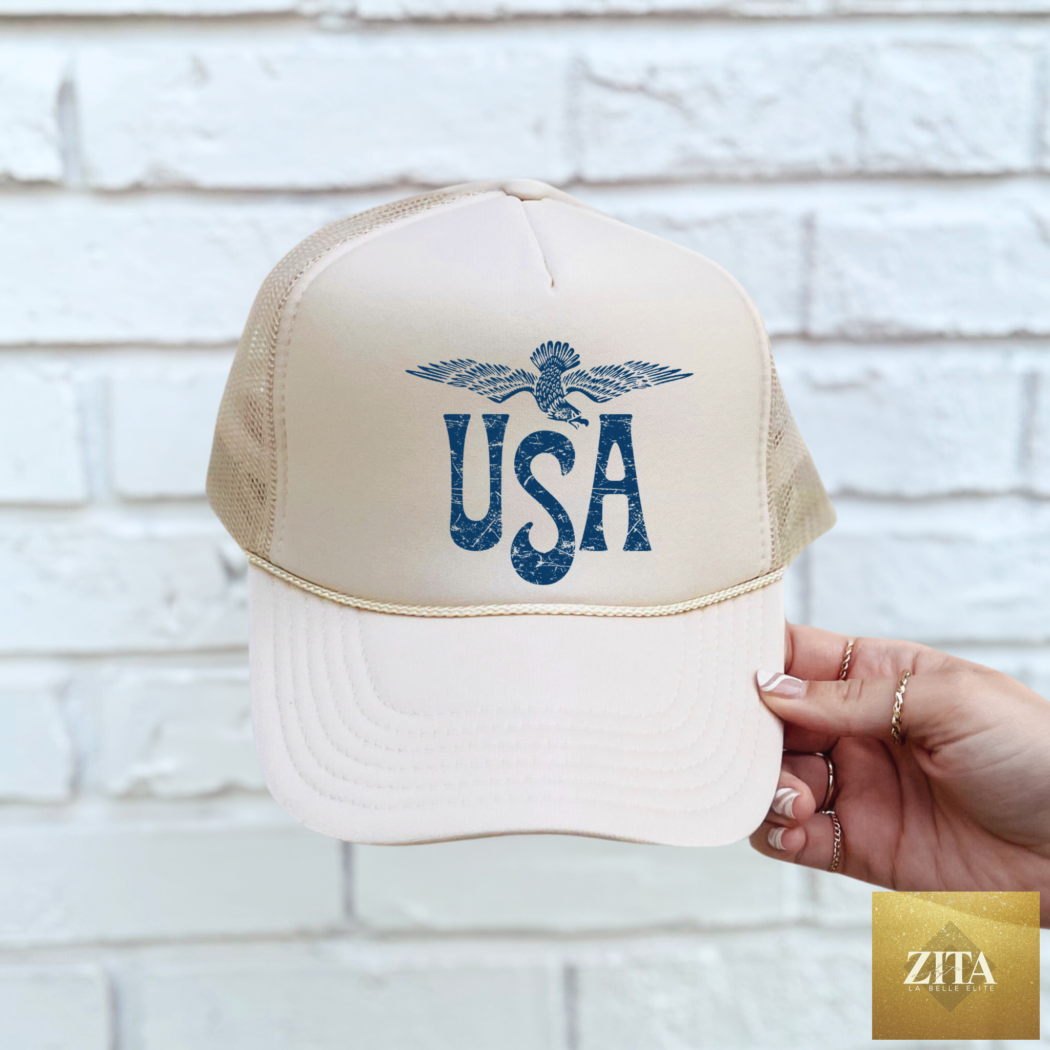 Tan USA Eagle Trucker Hat by Hey Jude Graphic Tees featuring a bold eagle graphic on the front.