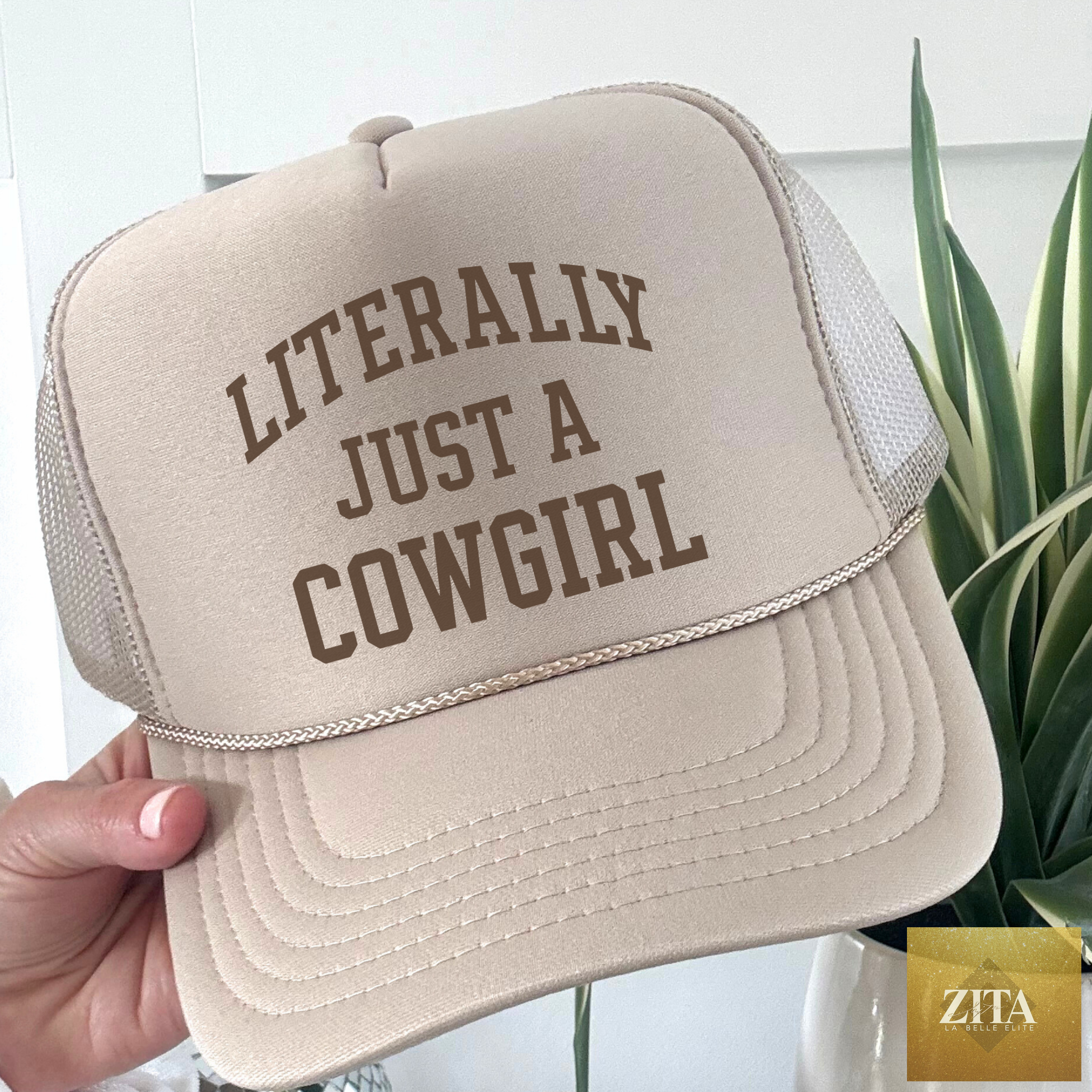 Tan cowgirl trucker hat with foam front featuring western cowgirl design, adjustable strap, and mesh back for casual Western style.
