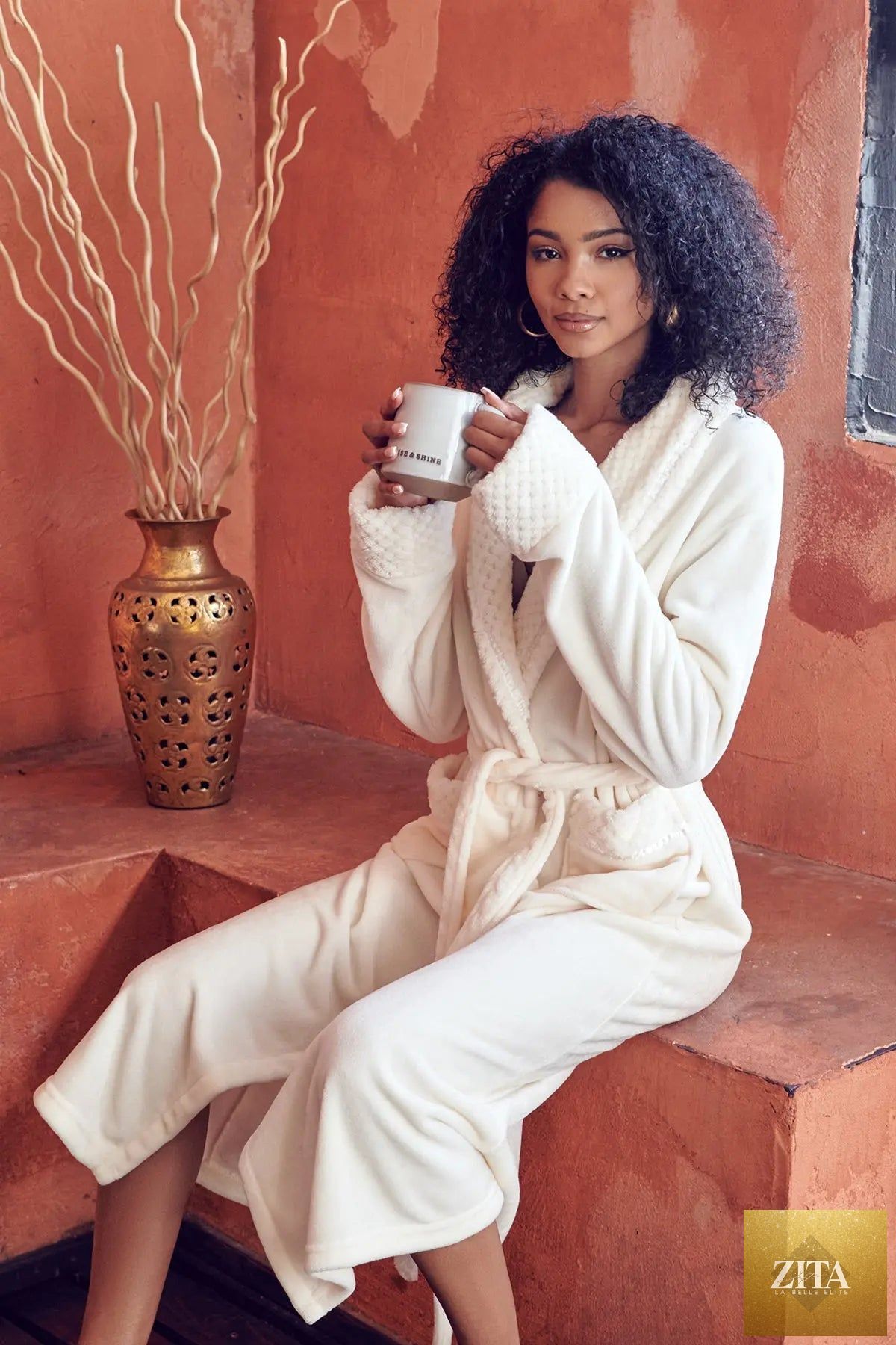 Women's plush bathrobe by Lotus Linen in tan color, featuring a soft, cozy fabric and relaxed fit for comfort.
