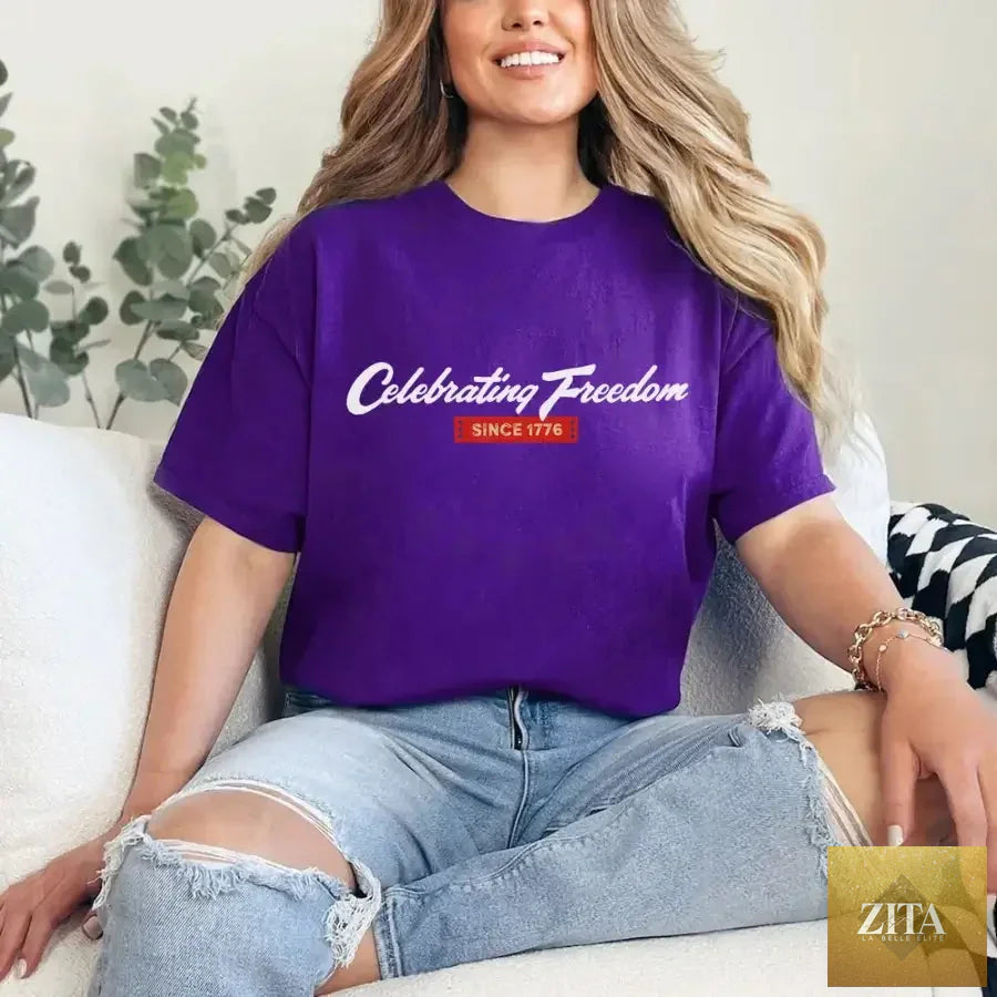 Purple 4th of July patriotic T-shirt by Adorb Custom Tees with "Celebrating Freedom Since 1776" design.