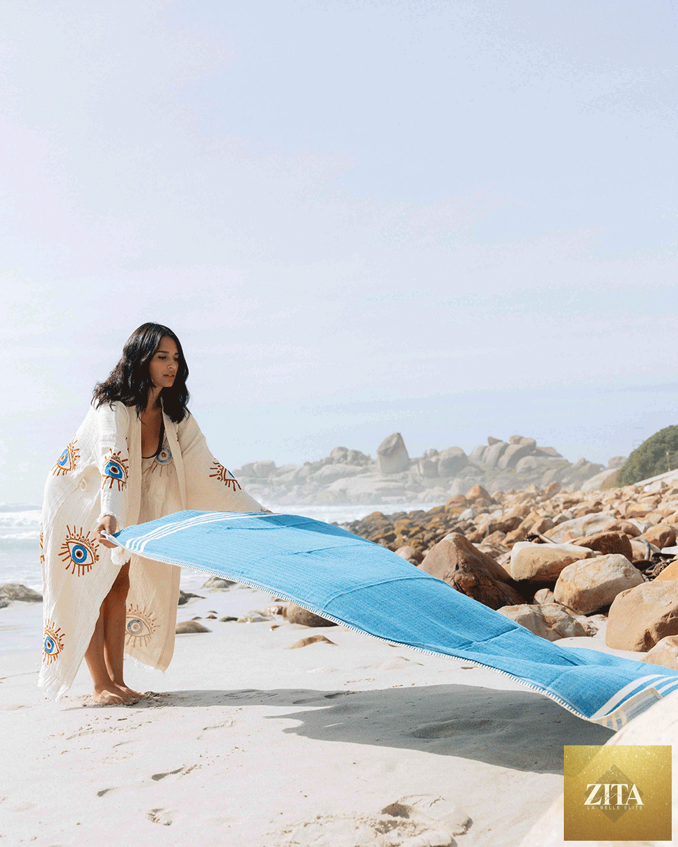 Blue Zita La Belle Elite Turkish Farm House Towel without fringe, showing soft, woven cotton texture in a bundle.