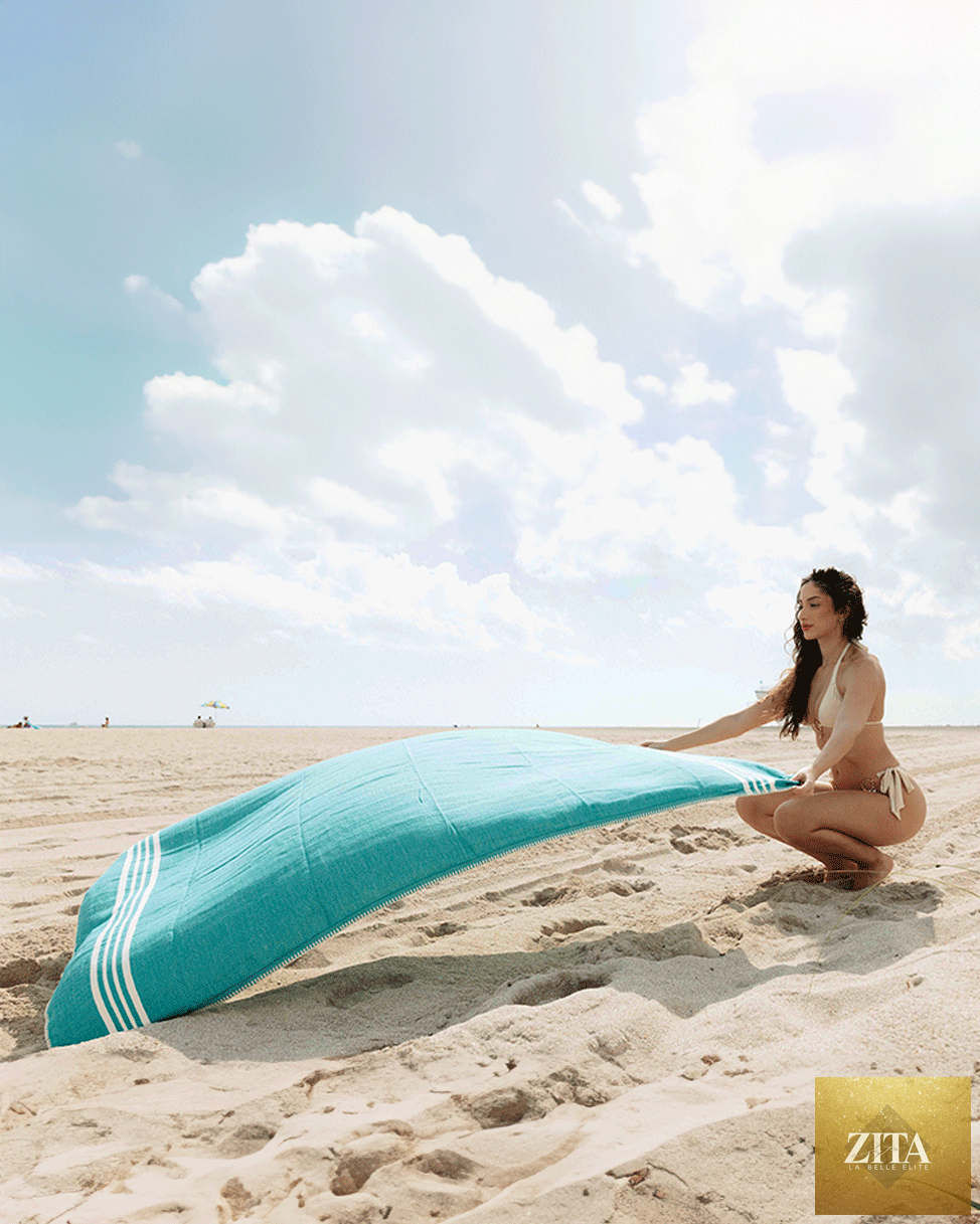 Green Zita La Belle Elite Turkish towel without fringe, featuring soft, woven cotton fabric and traditional design.