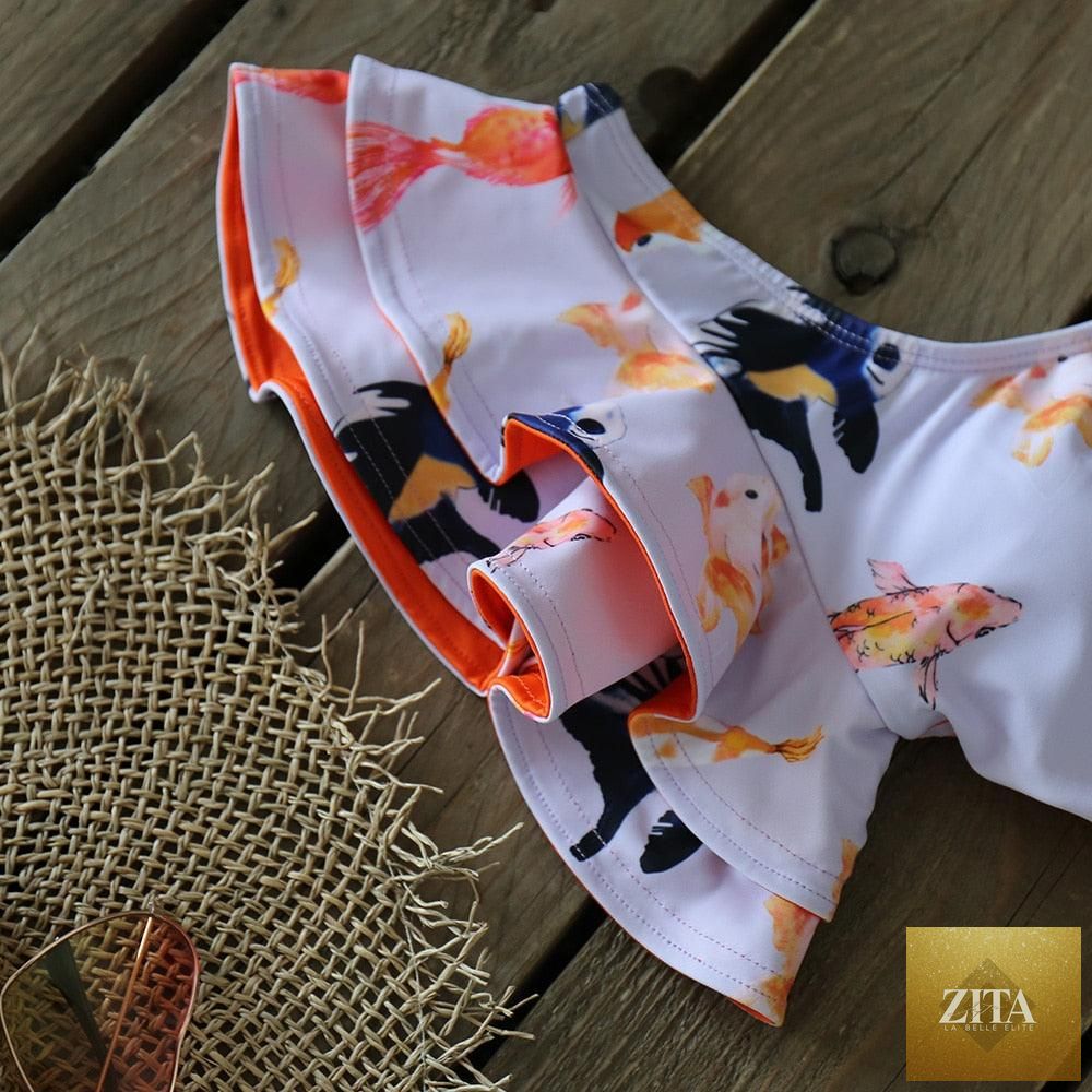 Two-piece women's push-up padded bra bikini set with ruffles and low-rise design, perfect for beachwear and swimming.