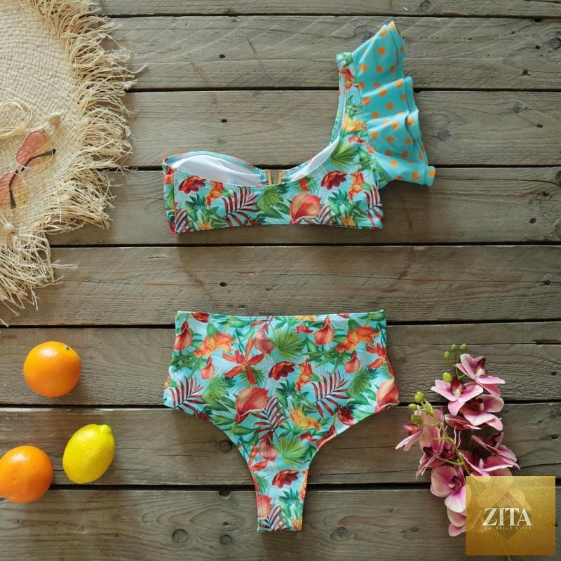 Two-piece women's bikini set with push-up padded bra, ruffles, low-rise design, from Stevvex, ideal for beachwear and swimming.