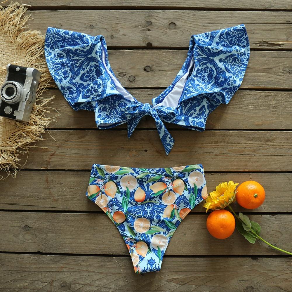 Stevvex two-piece women's push-up padded bra bikini set with ruffles, low-rise bandage style, perfect for beachwear and swimming.