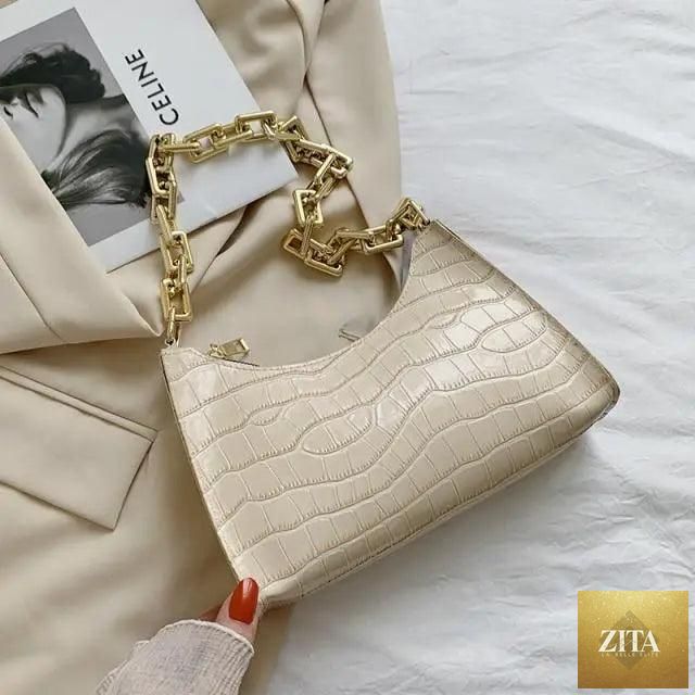 Stevvex luxury zipper handbag with unique pattern, stylish textured surface, small square shape, ideal for women.