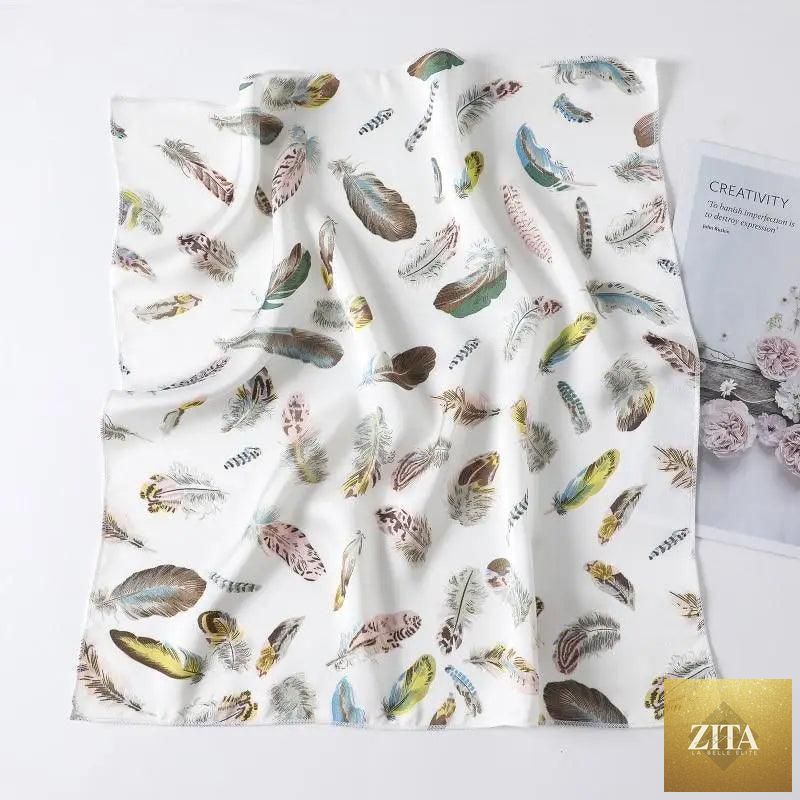 Stevvex square silk scarf for women with a colorful printed design, suitable as a neck scarf, hair band, or shawl.
