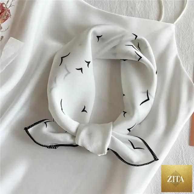 Stevvex square silk scarf for women featuring a fashionable printed design, versatile small neck accessory, bandana, or hair band.