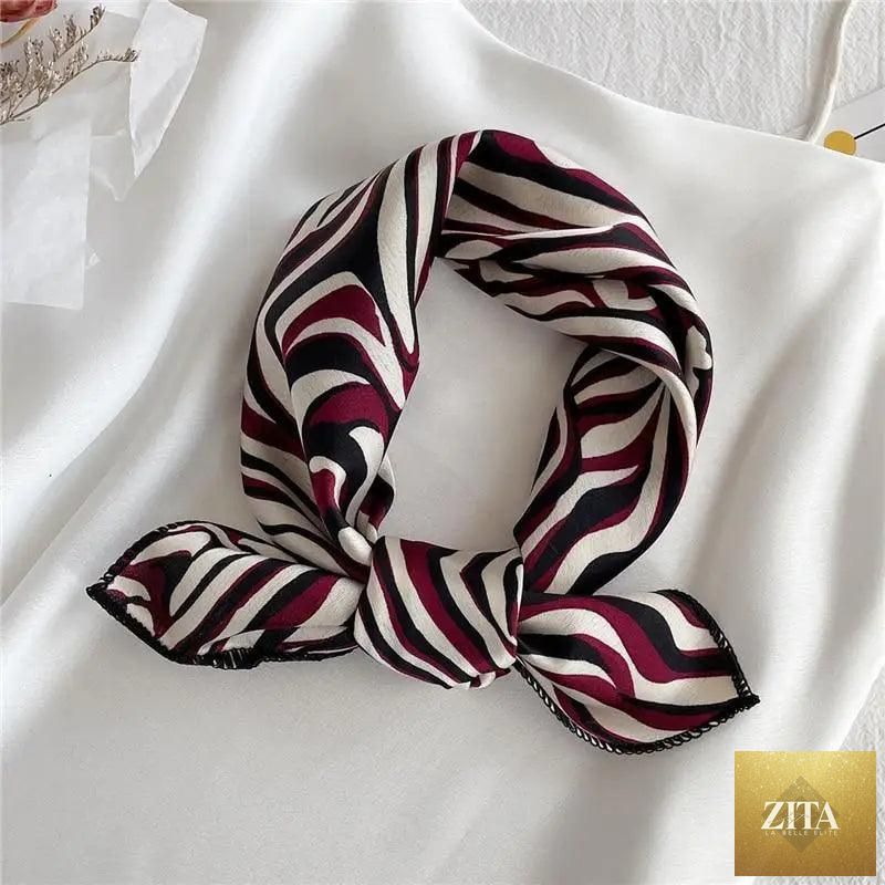 Stevvex square silk scarf for women with fashionable printed design, small neck style, versatile as hair band or shawl accessory.