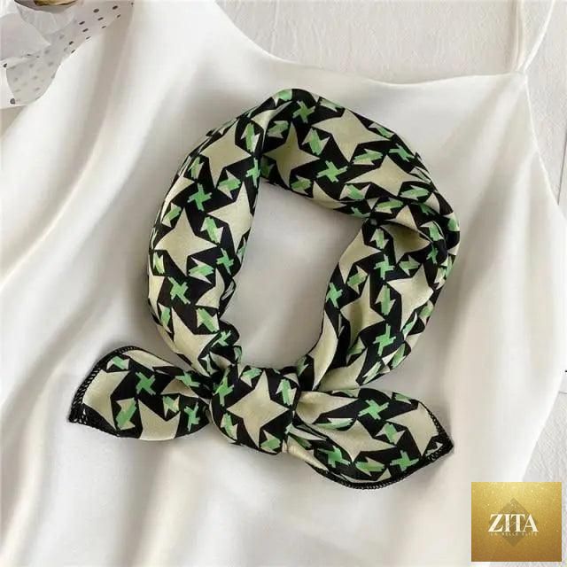 Stevvex square silk scarf for women with fashionable printed design, small size, versatile for neck, hair, or shawl styling.