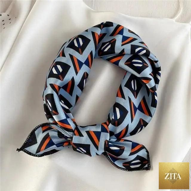 Stevvex square silk scarf for women with fashionable printed design, versatile for neck, hair, or shawl use.