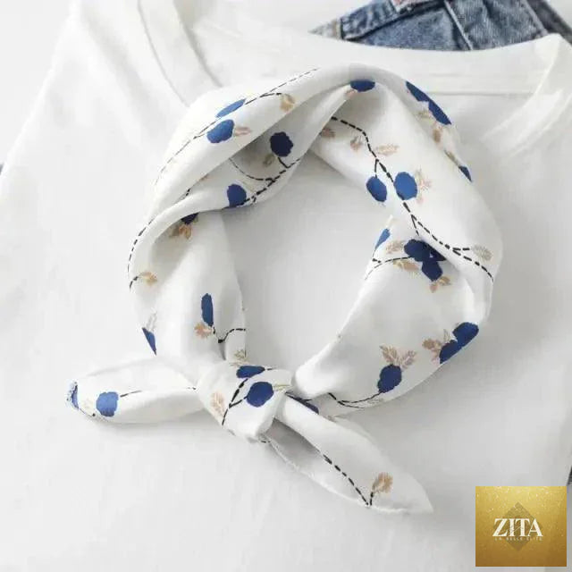 Stevvex square silk scarf with colorful printed design, versatile accessory for women, can be worn as a neck scarf or hair band.