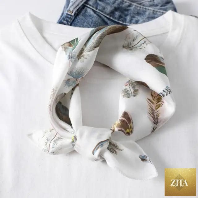 Stevvex square silk scarf with colorful printed design, versatile accessory for women, worn as neck scarf, hair band, or shawl.