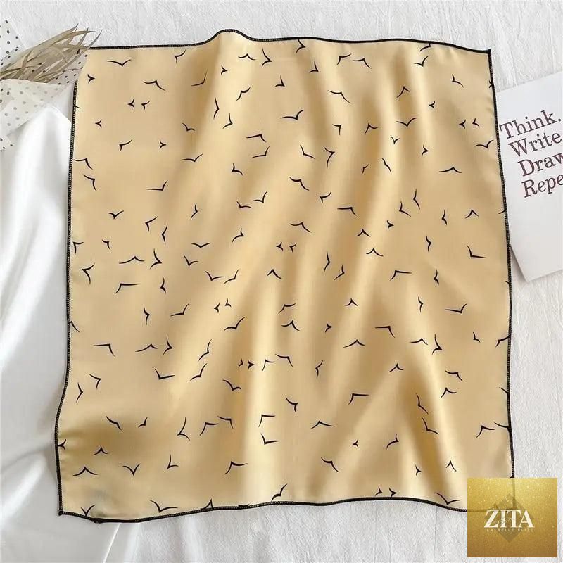 Stevvex square silk scarf for women with a fashionable printed design, versatile for neck, hair, or accessory styling.
