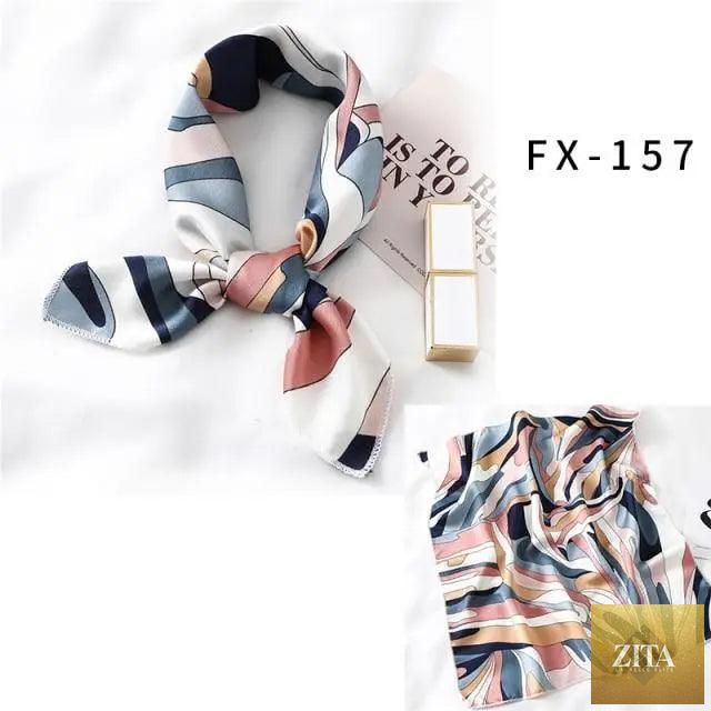 Stevvex square silk scarf for women, printed and versatile, worn as a neck scarf, hair band, or shawl, with vibrant patterns.