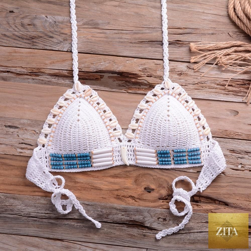 Vintage blue blazer and high-waist halter bikini set with sequins and crochet details, perfect for beachwear and swimwear fashion.