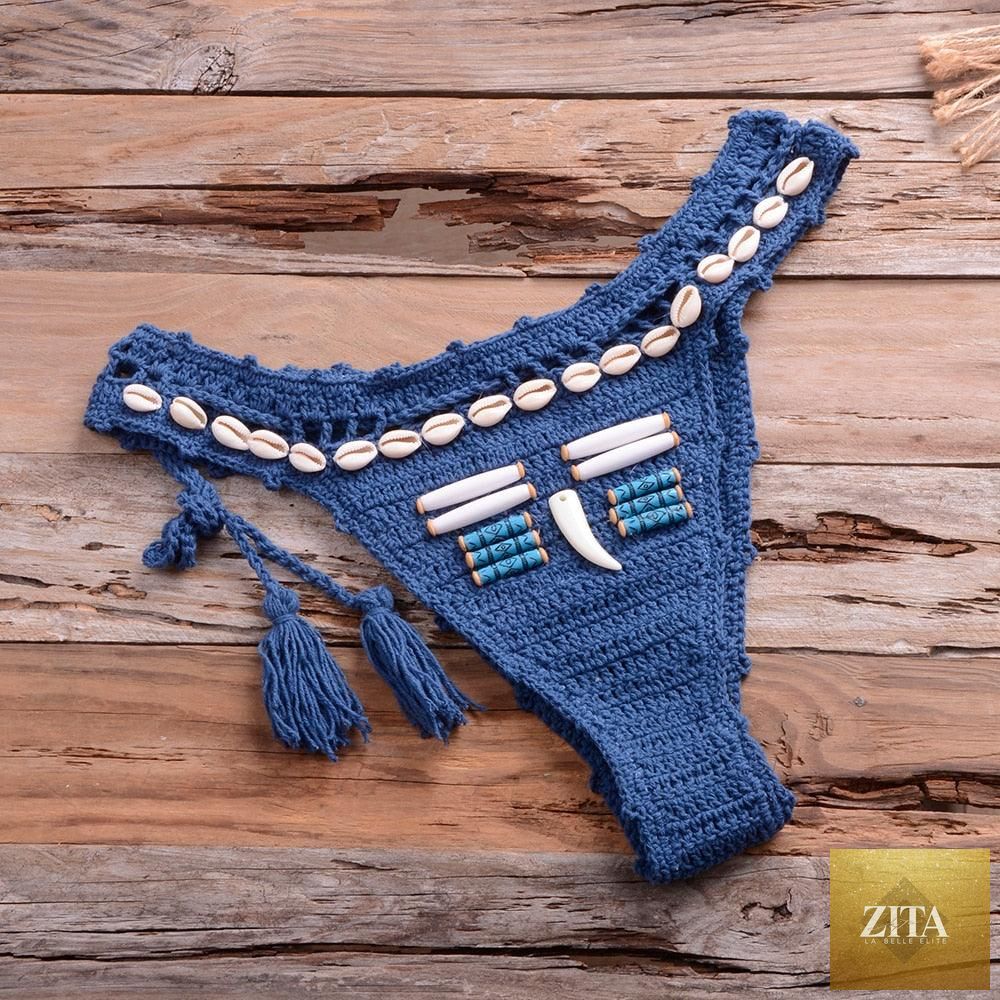 Vintage blue blazer 2-piece halter bikini set with high waist, sequins, crochet details, and push-up design for women at the beach.