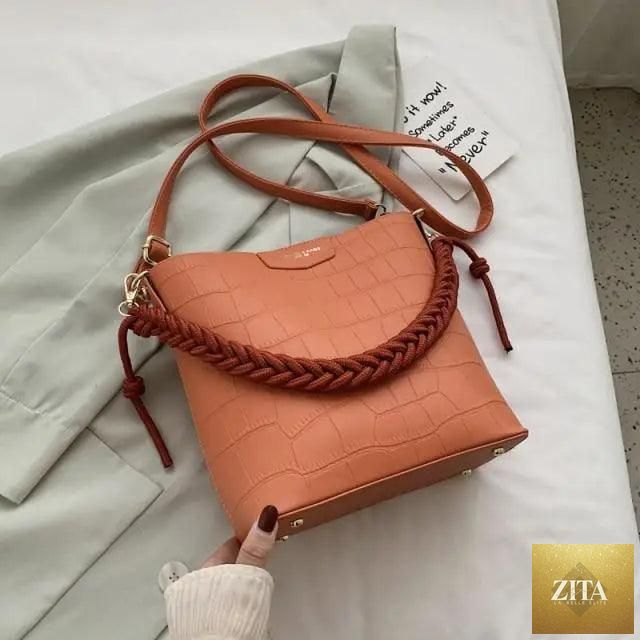 Elegant genuine leather women's bucket bag with stone pattern, fashionable vintage style shoulder bag for ladies by Stevvex.