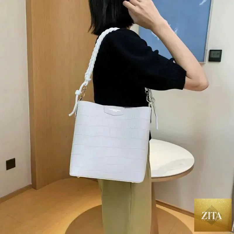 Elegant vintage-style women's bucket bag by Stevvex, genuine leather shoulder bag with a stone pattern for ladies.