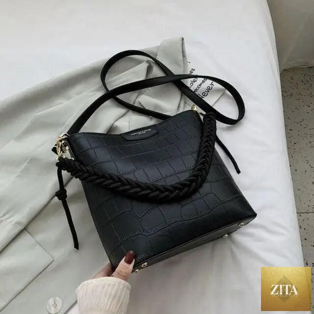 Elegant vintage women's bucket bag by Stevvex with genuine leather, stone pattern, shoulder strap, ideal for stylish ladies.