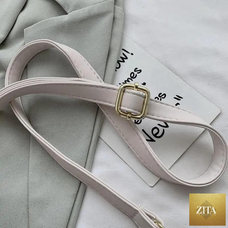 Elegant genuine leather women's bucket shoulder bag with a stone pattern, featuring vintage style and fashionable design by Stevvex.