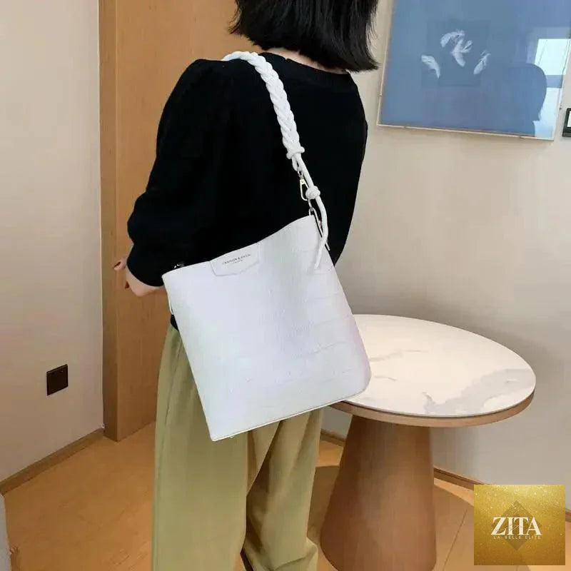 Elegant genuine leather women's bucket bag with stone pattern, stylish shoulder bag for ladies by Stevvex.