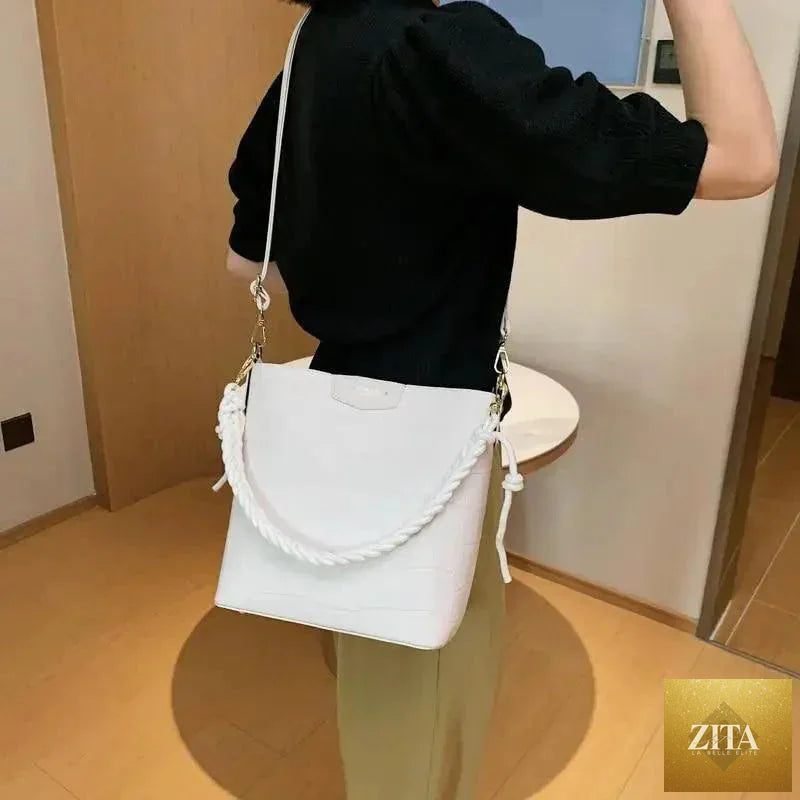 Elegant genuine leather women's bucket bag with stone pattern, vintage style, shoulder strap, by Stevvex for fashionable ladies.