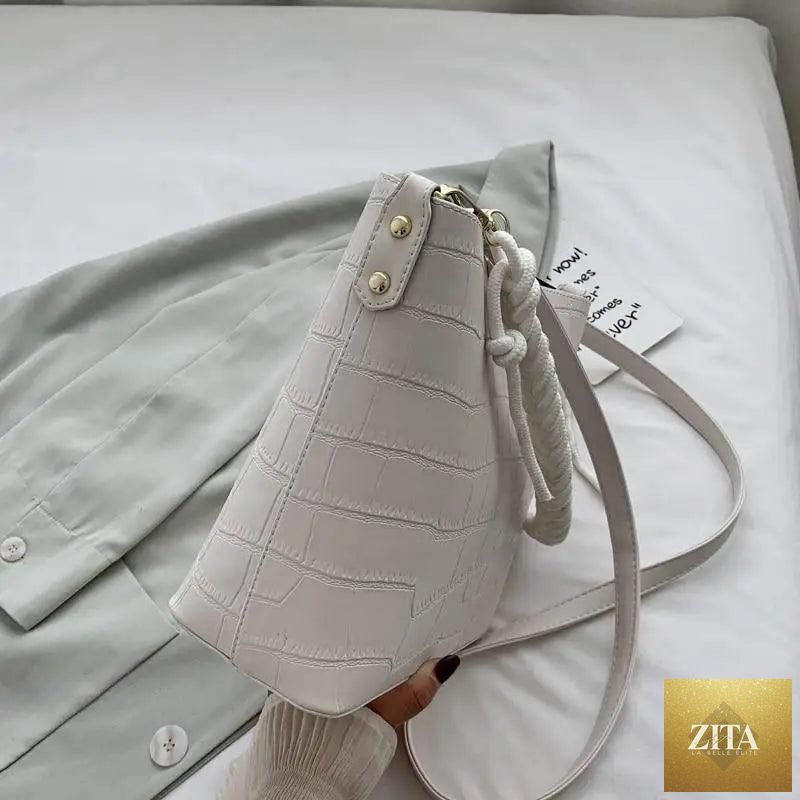Elegant genuine leather women's bucket bag with stone pattern, vintage style shoulder bag from Stevvex for fashionable ladies.