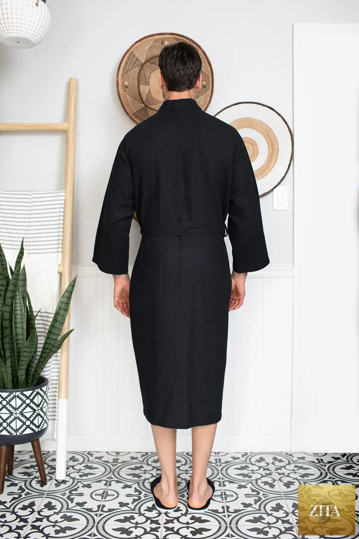 Men's waffle spa bathrobe by Lotus Linen, lightweight and absorbent, shown hanging with a relaxed fit and textured waffle fabric.