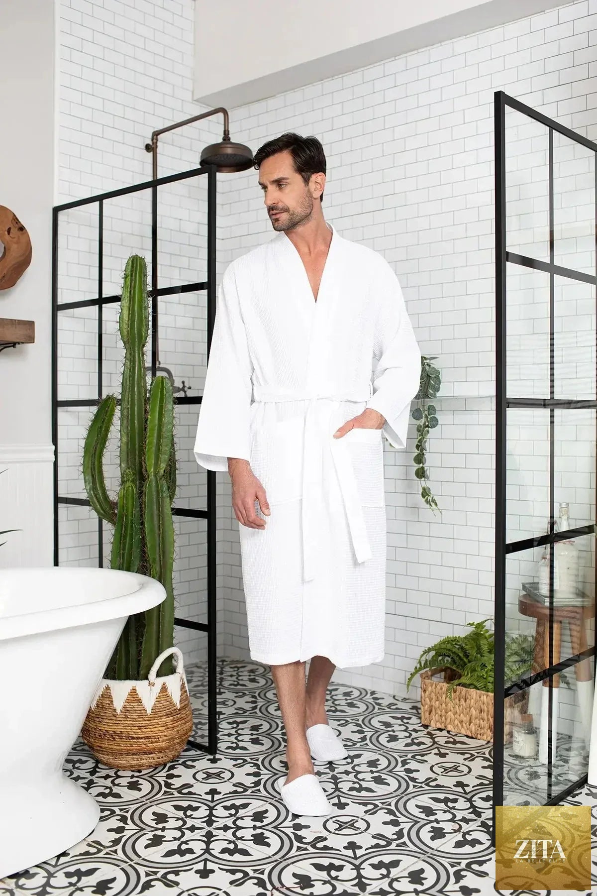 Lightweight Lotus Linen waffle spa bathrobe for men, made of absorbent fabric, shown hanging with a relaxed fit and textured pattern.
