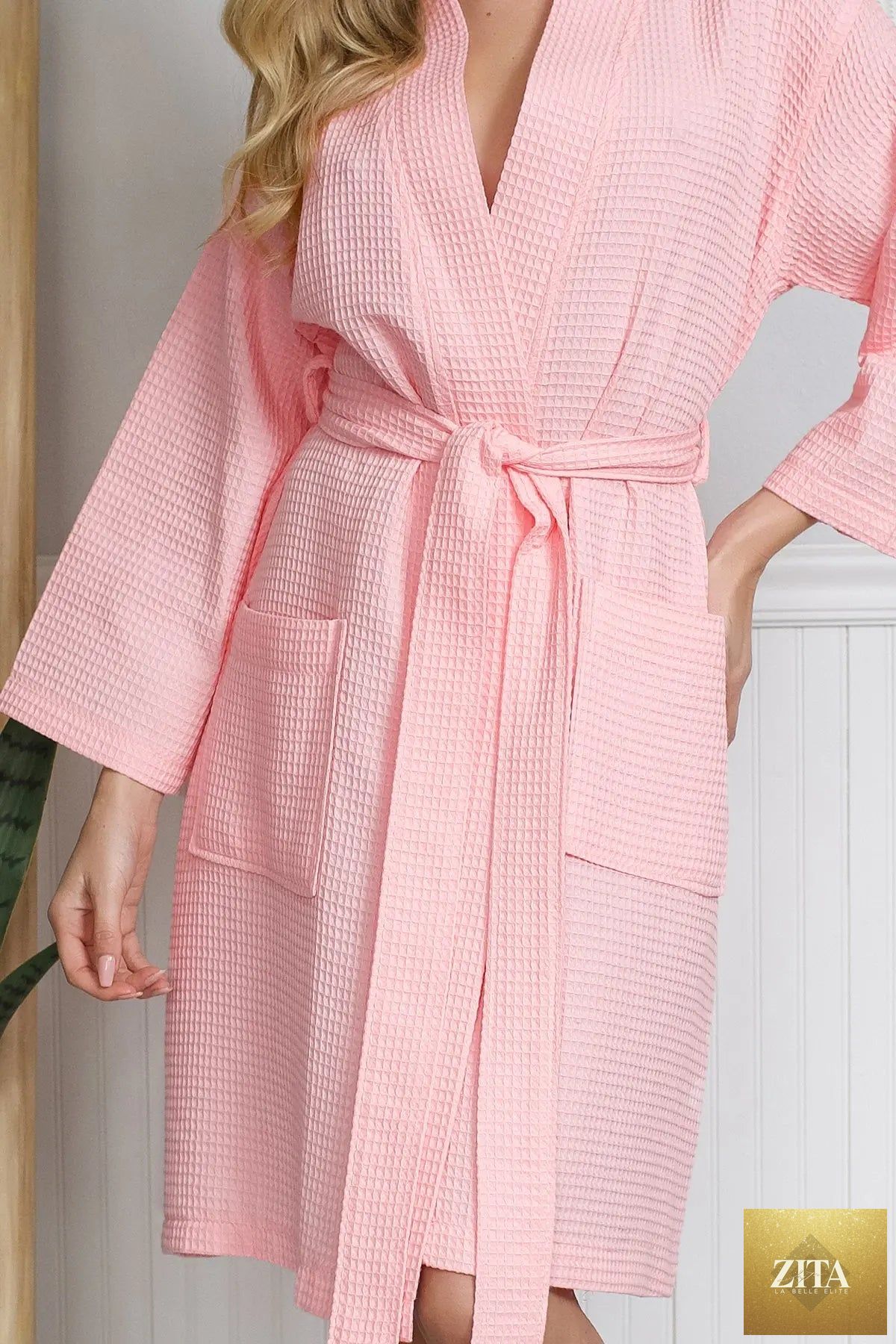 Knee-length Lotus Linen women's waffle robe with a textured waffle weave, cozy and soft for comfortable lounging.