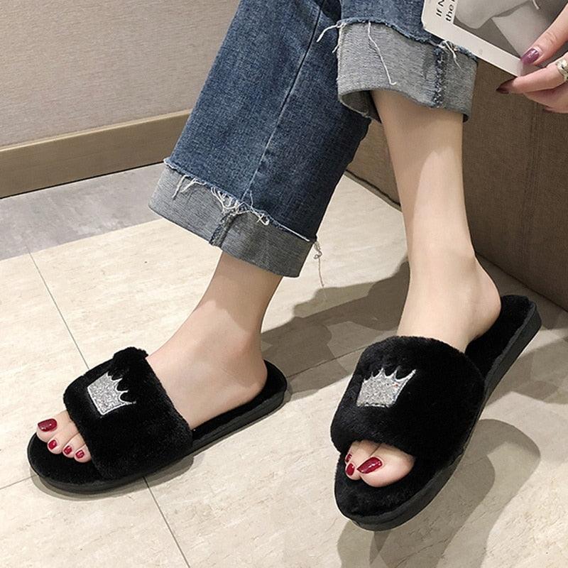 Stevvex women's faux fur indoor slippers with heart-shaped open toe design, soft fuzzy material, memory foam, and flat slide style.