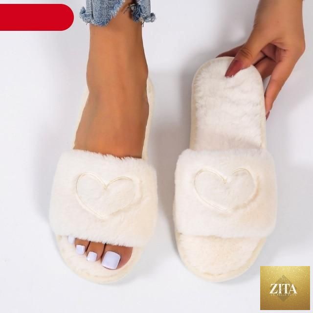Stevvex women’s faux fur indoor slippers with heart-shaped design, soft memory foam, open toe, and plush fluffy interior.