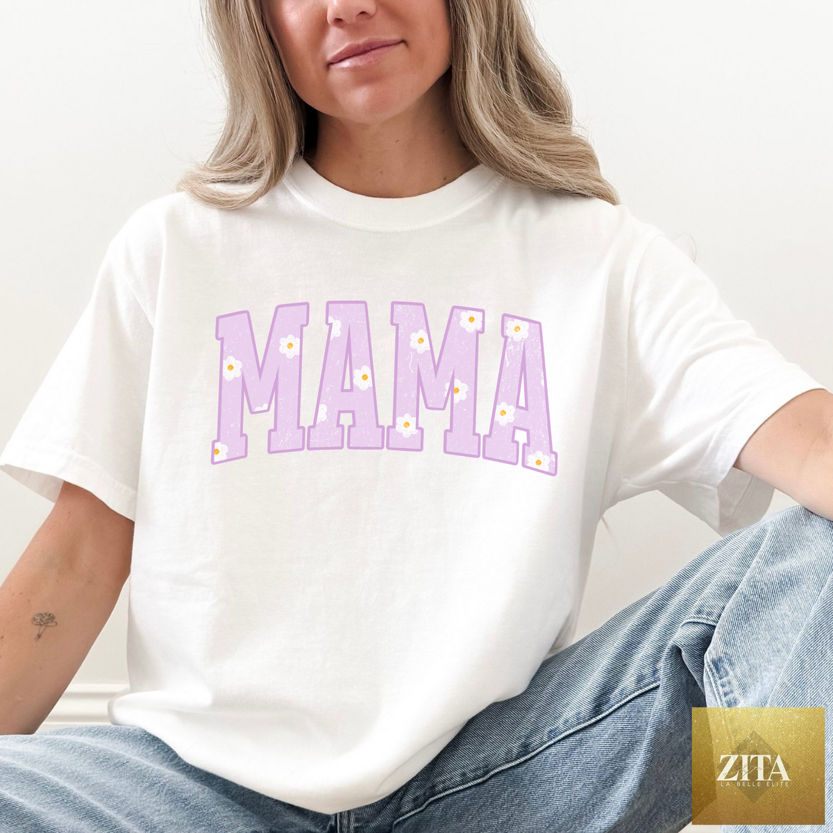 White MAMA Daisy Graphic Tee by Hey Jude Graphic Tees featuring a colorful daisy design on soft cotton fabric.