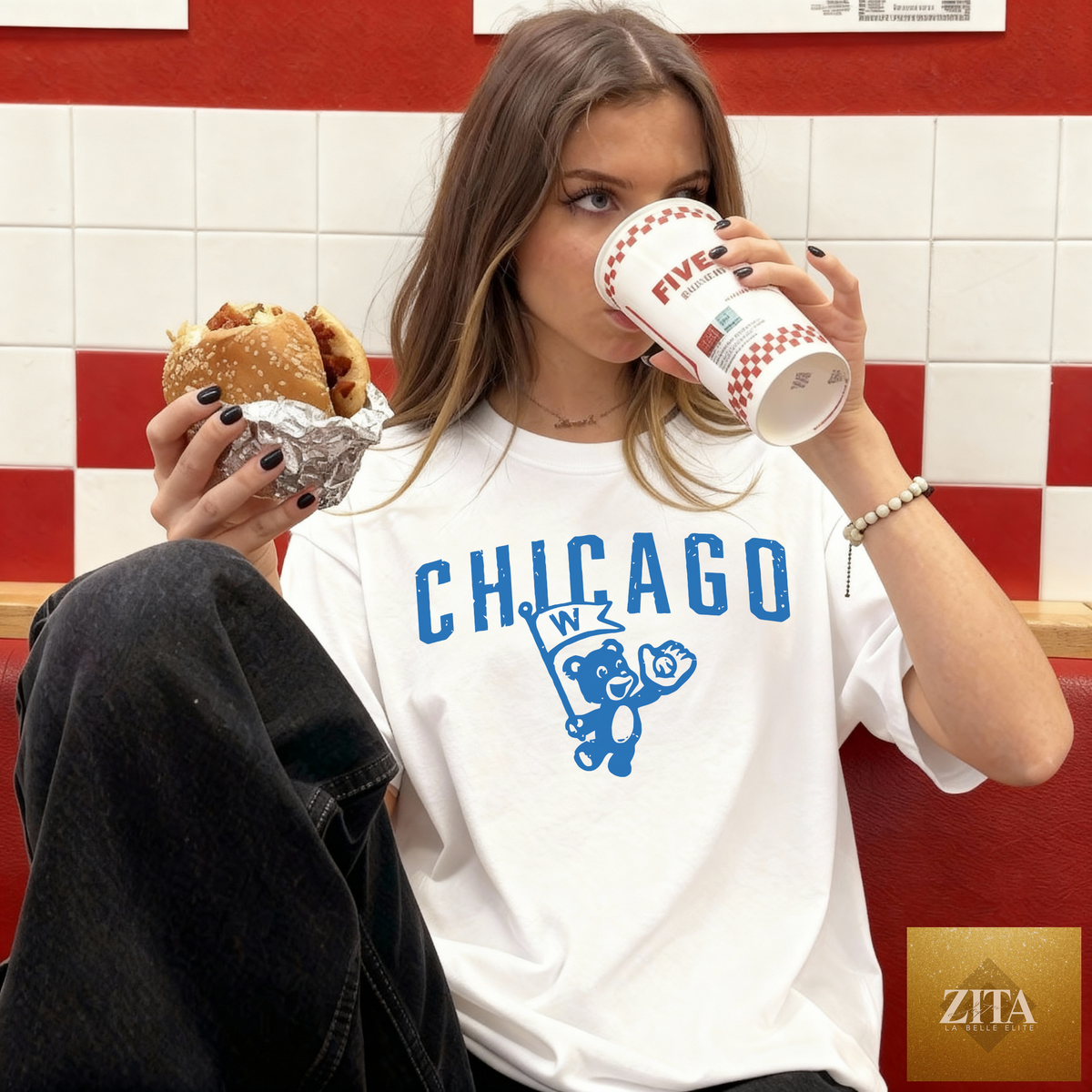 White Chicago Vintage Cub Graphic Tee by Hey Jude Graphic Tees featuring a retro cub design on the front.
