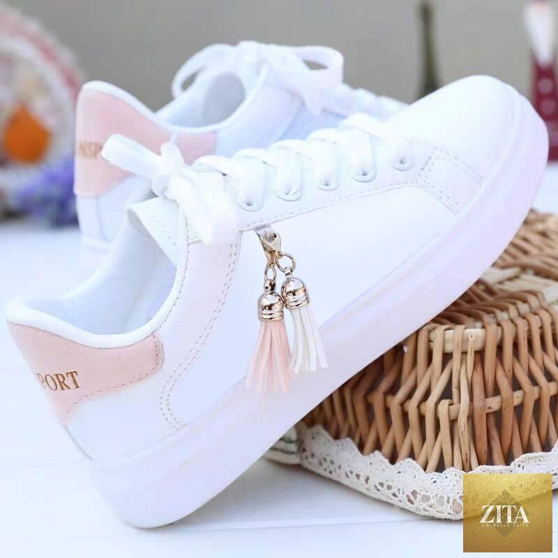 White women's breathable sneakers by Stevvex featuring lace-up design, flat low top, casual sporty style, and comfortable soft soles.