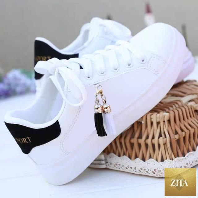 White Stevvex women's breathable sneakers with lace-up design, casual flat low top shoes for comfortable walking and everyday wear.